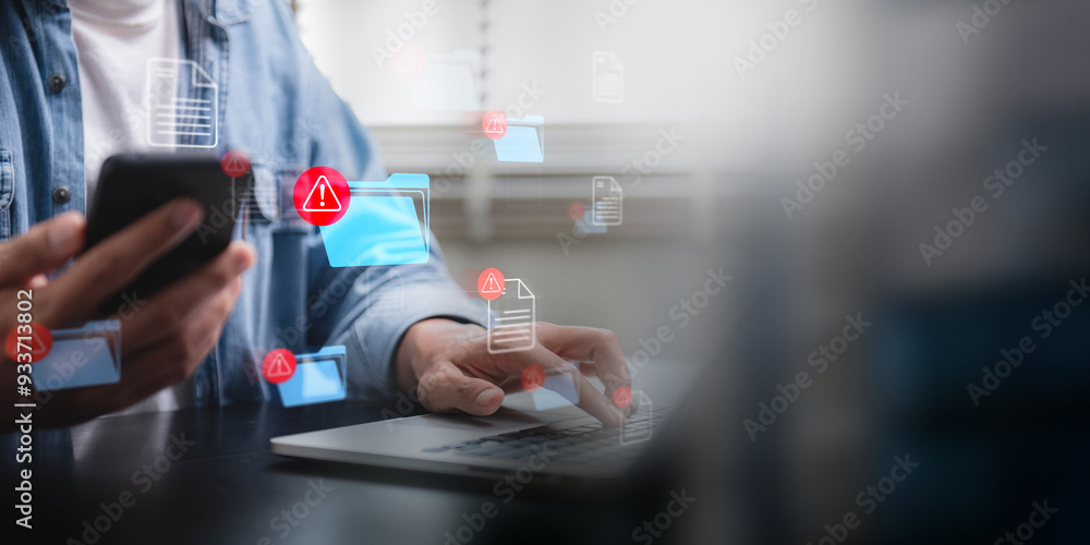 Leinwandbilder hacking and spam warning symbol on document file. Person using a smartphone and laptop with multiple cybersecurity alerts on a digital interface, highlighting potential data threats.