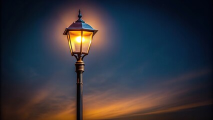 A single street light lamp post illuminating the darkness of night, city, street light, solitude, evening, eerie, urban landscape, isolated, glow, atmospheric,night, simplicity, illumination
