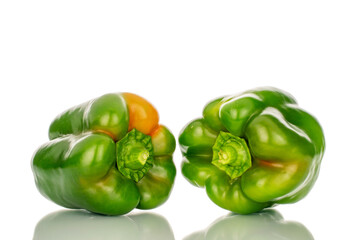 Two sweet green peppers, macro, isolated on white background.