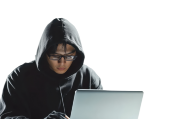 A person in a hoodie and glasses working on a laptop, symbolizing cybersecurity, technology, and hacking in a modern digital age.