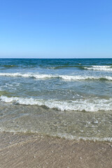 Subtle ocean waves on the beach