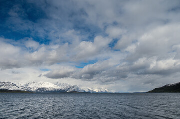 snowy landscape with snow-covered mountains along the road from Alta to Tromsoe, Norway