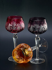 Three overhhead multicolor crystal goblets