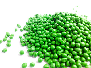 Green prairie masterbatch granules on white background. Color pigment carrier polymer in plastic industry