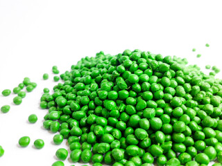 Green prairie masterbatch granules on white background. Color pigment carrier polymer in plastic...