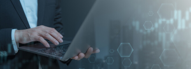 businessman on document planning the business plans and analyse  profitability of working companies with digital augmented virtual graphics for project manager working on laptop and update information