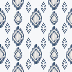 Seamless Ikat ethnic pattern. Abstract textured background