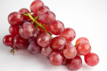 Red grape isolated on white background. Clipping path.