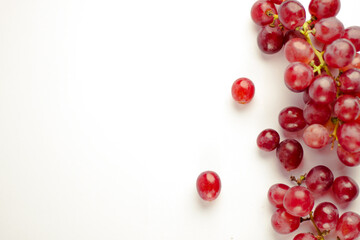 Red grape isolated on white background. Top view