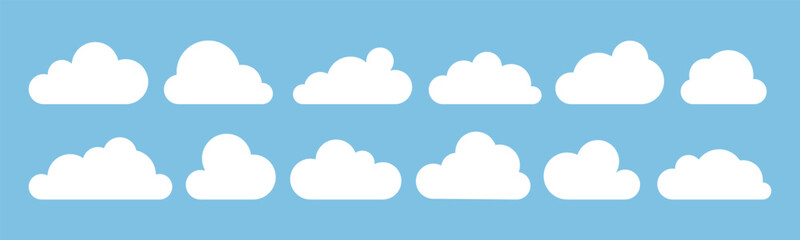 White clouds in flat design. Vector clouds isolated on blue sky