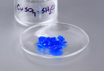 Copper sulfate inorganic compound stock photo images. Chemical formula CuSO4. Blue crystal on a...