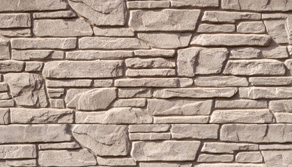 Light brown stone fence, stone background