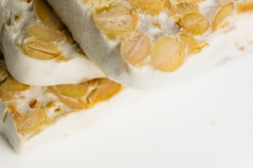 piece of tempeh cube isolated on white background