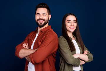 Photo of cheerful lovely married couple wife husband wear stylish clothes crossed arms isolated on dark blue color background