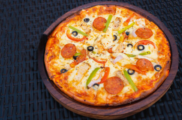 Delicious Pepperoni Pizza with cheese olives nd capsicum italian food