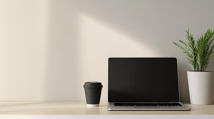 Bright Office Desk with Laptop, Coffee Mug, and Indoor Plant