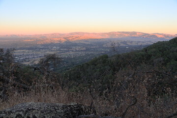 The last light of the setting sun illuminates the hills at the edge of Livermore Valley