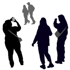 Vector silhouettes of young people. Three girls view from the back taking pictures on the phone. The guy and the girl are leaving