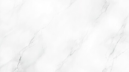 Obraz premium A smooth, white marble surface showcasing subtle gray veining perfect for countertops or interior design projects in a well-lit setting