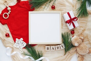 Wooden square frame mockup, Christmas flat lay,  blank frame for pregnancy announcement design, baby name sign, nursery art presentation.