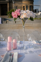 Chairs and table decorated with candles and flower. Wedding Day