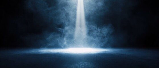 Fototapeta premium A dramatic spotlight illuminating swirling smoke in a dark, moody atmosphere with blue tones.