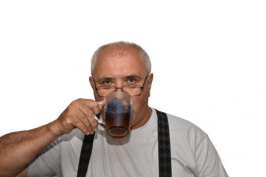 An elderly man with a short haircut is drinking something from a cup.