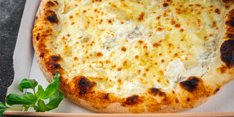 pizza four cheese fresh meal food snack on the table copy space food background rustic top view