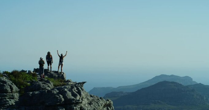 Group, friends and mountain top for celebration, space or sky for hiking together on adventure, fitness or trekking. People, hill and goal for mockup, cheers or exercise on summer travel in Argentina