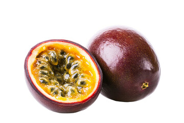 A whole and half passionfruit, revealing the yellow flesh and black seeds on a white transparent background