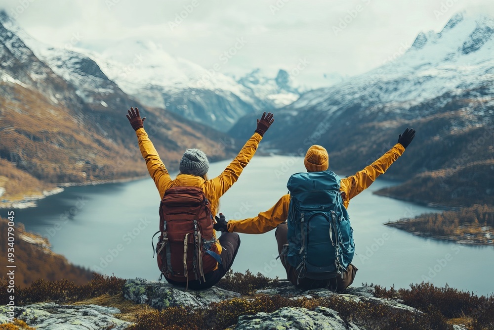 Wall mural couple friends giving five hands traveling outdoor hiking in norway mountains adventure lifestyle po