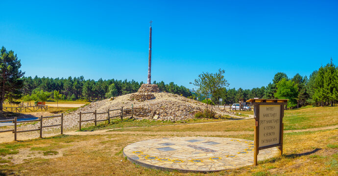 Foncebadon, Spain - August 5, 2024. The iconic Cruz de Ferro, a significant landmark on the Camino de Santiago, near Foncebadon. Castilla y Leon, Spain.
