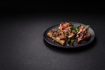 Variation of several toasts or bruschetta with prosciutto, mushrooms and veal