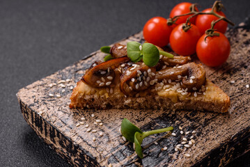 Variation of several toasts or bruschetta with prosciutto, mushrooms and veal