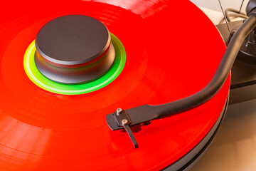 Coloured vinyl record spinning on a hifi turntable
