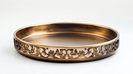 Elegant Gold Decorative Tray with Intricate Design - This decorative tray features a gold finish and intricate design. The tray symbolizes beauty, luxury, and craftsmanship. It can be used for serving