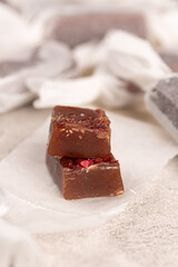 Toffee made of bitter chocolate with red hot chili pepper, handmade