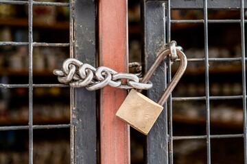 Locked door with chain and padlock