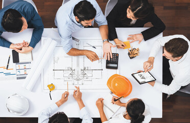 Top view banner of diverse group of civil engineer and client working together on architectural...