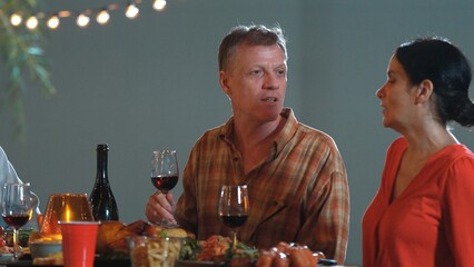 Family together for holiday celebration in garden. Old romantic senior drink wine have dinner. Outdoor camping activity, celebrate and spend time with lovely couple strengthen family bond. Divergence.