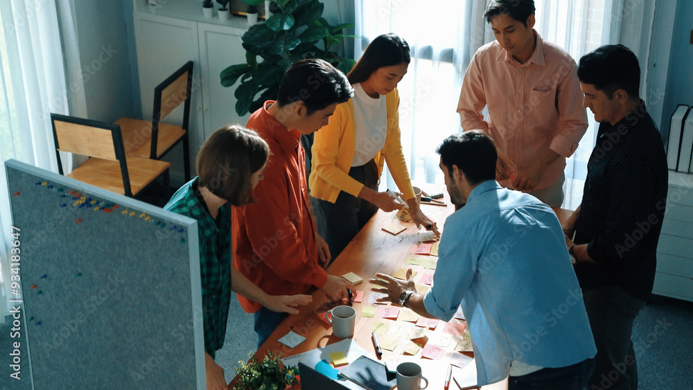 Poster top view of smart business team writing marketing idea on colorful sticky notes while start up team 
