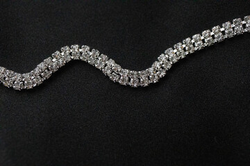 Lux necklace on black silk background