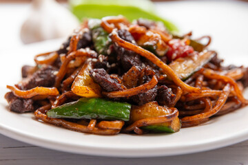 fried lagman, Lamb Stir Fry Leghman, Uzbek Laghman Traditional Noodle Dish 