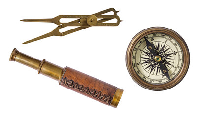 Vintage old compass, telescope and divider isolated