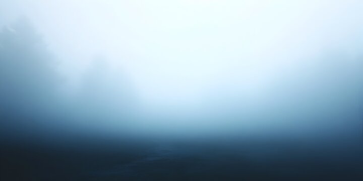 Foggy hazy and muted backdrop with a seamless gradient texture in shades of gray and blue creating an atmospheric and dreamy visual with a sense of mystery and obscurity