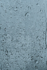 Window overlooking a rainy street.