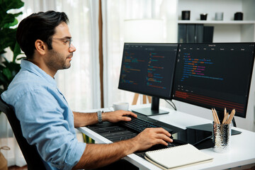 Smart IT developer working software development coding with creating application program update...