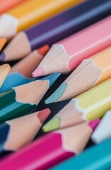 Fototapeta premium Colorful assortment of pencils arranged on a flat surface for creative activities