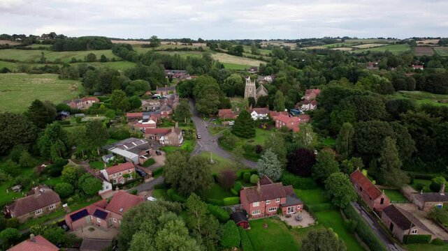 Aerial video footage of the remains of Bolingbroke Castle a 13th century hexagonal castle, birthplace of the future King Henry IV, with adjacent earthwork. and views of Old Bolinbroke Village.