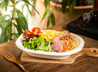Duck Breast Cold Noodles with Lemon Sauce and herbs served in dish isolated on table side view of taiwan food